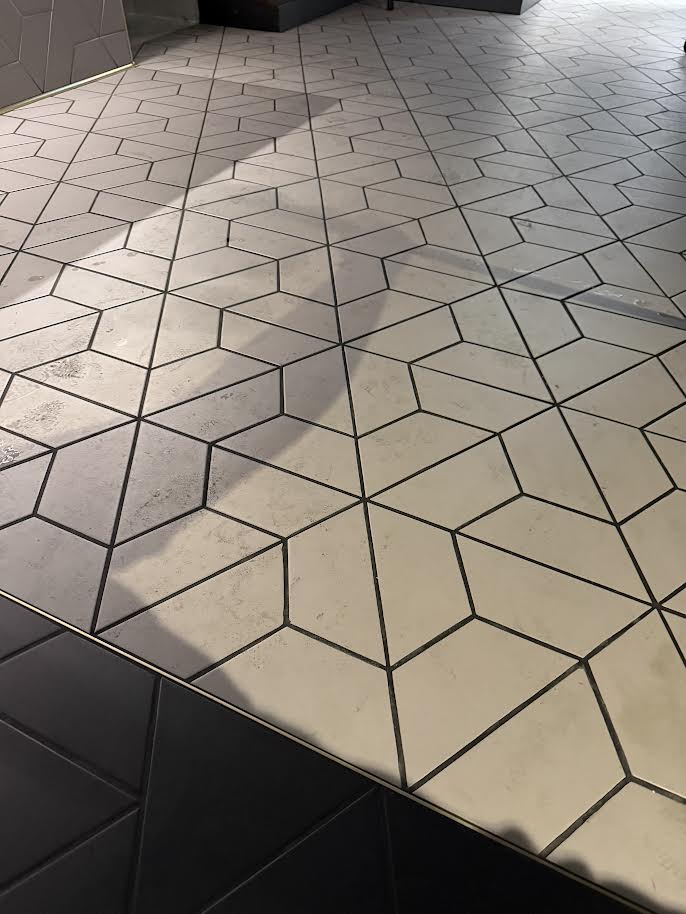 Geometric Tile Floor — Before